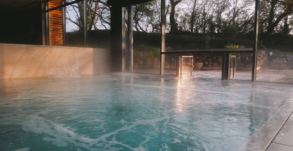 A photograph of a table in front of an aquarium tank A photograph of a table in front of an aquarium tank